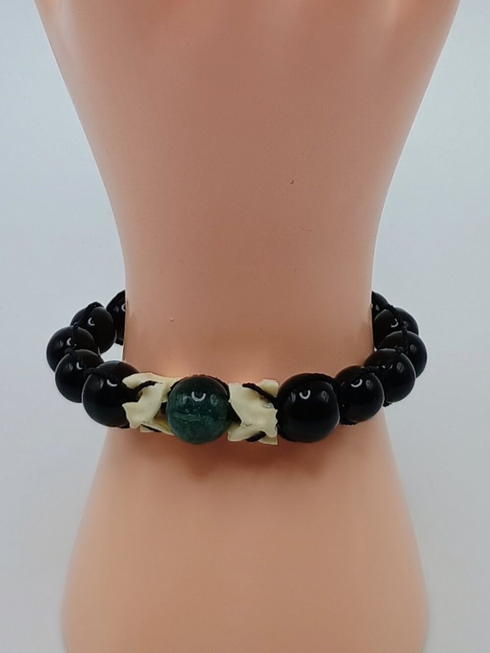 Spiritual Amulet Bracelet with Carved Black Onyx and Green Jade